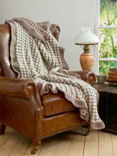 Mønstret strikket tæppe