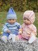 Sweater, cardigan, bukser, hue og hjelm