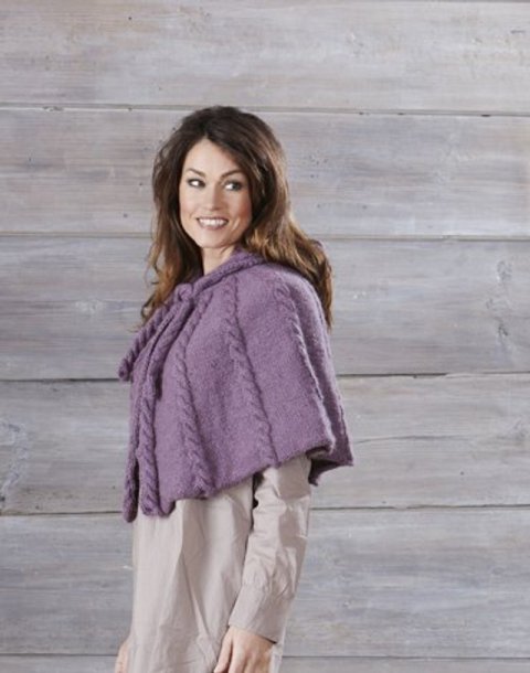 Poncho med fletninger